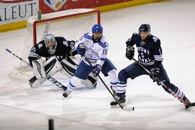 Working the puck along the boards